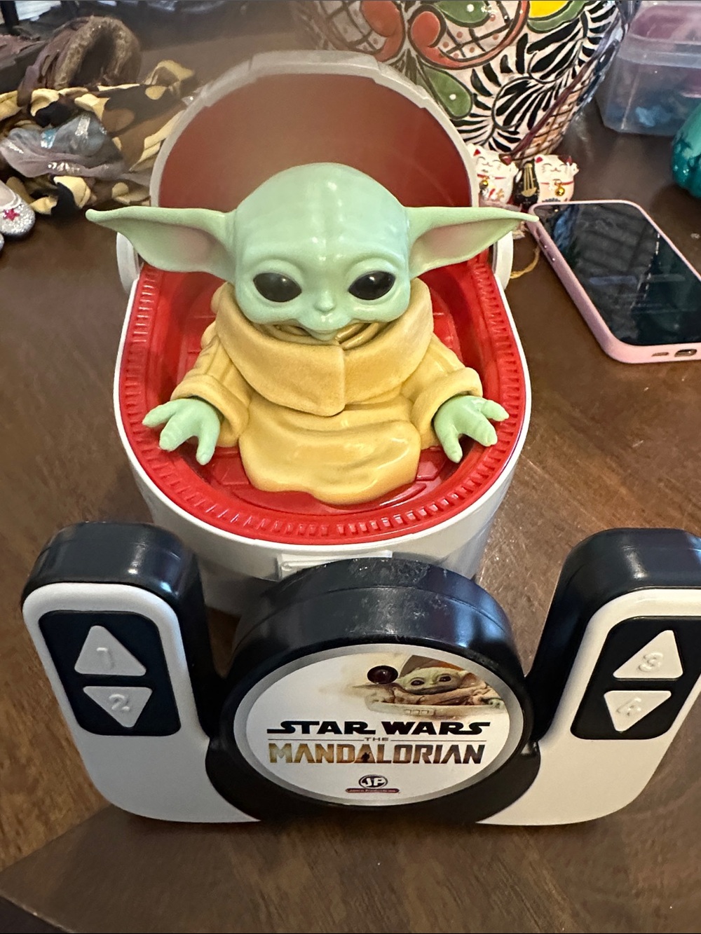Star Wars Grogu Figure in Green and Tan with Red Seat
